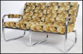 A superb 1970's two seater sofa of tubular chrome construction in the manner of pieff, the