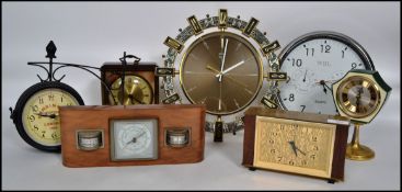 A collection of retro clocks to include wall and mantel with such makes as Metamec, smiths etc.