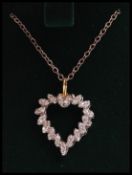 A white gold heart shaped diamond adorned ladies p
