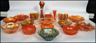 A good collection of vintage 20th century studio art carnival glass to include vases, set of six
