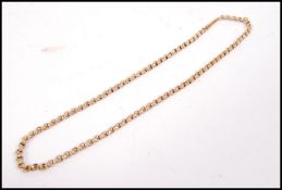 A 9ct gold chain( unmarked but tests ) having barrel clasp af. Total weight 6.8g