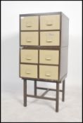 A vintage retro 20th century stack of two industrial set of eight filing / index drawers cabinet, in