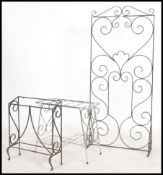 A collection of outside decorative wrought iron ob
