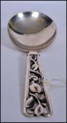 A large Danish silver  serving spoon with fabulous pierced rococo handle being marked Johannes