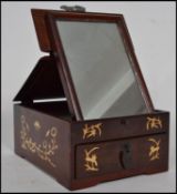 A vintage 20th century Chinese hard wood portable