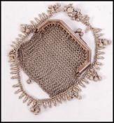 A silver white metal vintage asiatic ankle bracelet with ball finial chams  and multiple drops.