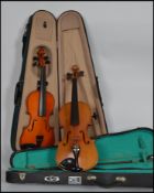 Two vintage violins, one being a Lark violin with