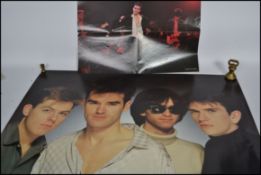 An original poster dating back to the 1980's featuring The Smiths full line up together with another