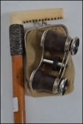 An ivory handled / knop walking stick with a worked white metal collar together with a set of