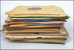 A large collection of vintage 78rpm vinyl records dating from the early 20th century through to