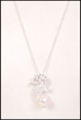 A 20th century ladies silver seahorse pendant and