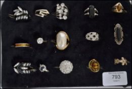 A group of 15 silver white metal and costume dress rings to include Art Deco, Scottish pebble,