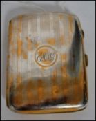 A silver hallmarked engine turned cheroot holder,