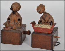 A pair of 19th century Japanese Kobi / Kobe toys modelled as figures, one playing an traditional