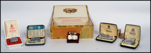 A collection of vintage 20th century Ronson cigarette lighters ( Five in total ), all boxed /