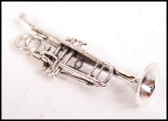 A fabulous 20th century silver trombone / trumpet