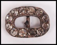 A Georgian 19th century silver and paste stone foil backed buckle brooch ( pin af ) Total weight