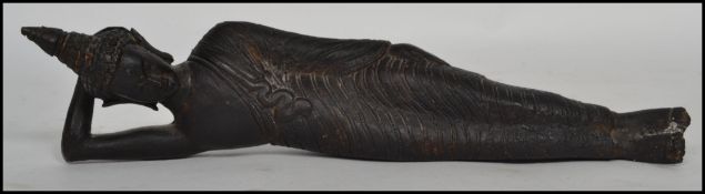 An early 20th century Oriental Chinese bronze figu