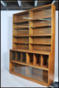 A large 1970's teak wood lawyers / barristers  stacking library bookcase cabinet having a