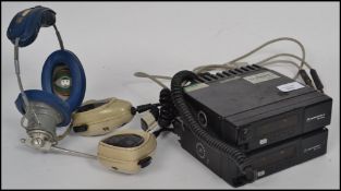 A pair of Motorolla MC Micro vintage CB radios wit