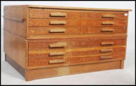 A retro mid-century architects  teak plan chest of drawers comprising of two sections with three