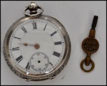 A late 19th / early 20th Swiss made silver pocket watch having a roman numeral chapter ring with