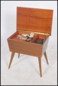 A retro 20th century work box and contents, hinged