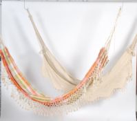 A pair of retro 20th century canvas and rope hammo