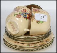 A set of 3 Royal Doulton trios, in the Kew pattern depicting colourful hand painted autumn vine