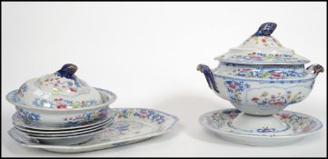 A 19th century Stone China part dinner service comprising a large tureen, meat platter and various