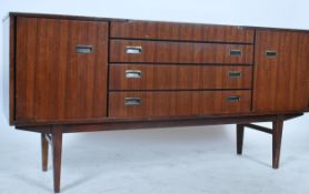 A 1970's teak wood sideboard by Beautility being r