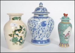 A vintage 20th century Masons vase in the Charteuse pattern together with a Chinese foliate