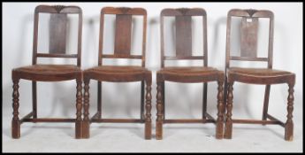 A set of 4 1930's Art Deco dining chairs being raised on block and turned legs united by