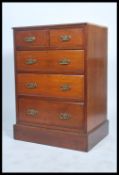 An early 20th century mahogany chest of drawers being raised on a plinth base having short drawers
