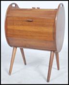 A vintage / retro  20th century work / sewing box. Having twin hinged covers to the top opening to