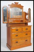 An Edwardian satin walnut dressing table chest of drawers having short over deep drawer