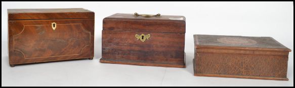 A group of three Victorian tea caddies / work boxes one having a brass escutcheon with swing