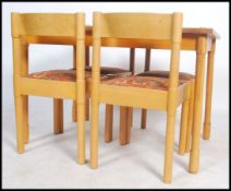 A 1970's retro Dining table and 4 chairs in the manner of Vico Magistretti. The table and chairs