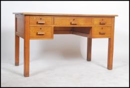 A 1930's Air Ministry type solid oak twin pedestal