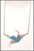 A fabulous Art Nouveau style ladies plique a jour necklace in the form of a bird with pearl to the