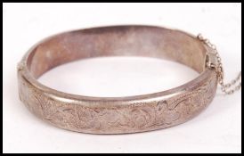 A silver hallmarked clasp bracelet bangle, Birmingham assay mark and makers mark for R P H Jewellery