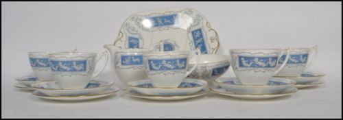 A vintage  Coalport Bone China six person tea service in the Reverly pattern, consisting of trio'