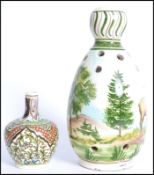 A 20th century hand painted studio pottery vase ba