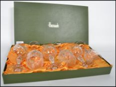 For Harrods of Knightsbridge, a set of 6 lead cut crystal sherry / wine glasses raised on a