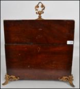 A 19th century large mahogany cellarette, fitted with  liner and sectional dividers, having a hinged