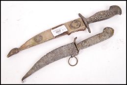 Two 20th century Indian silver white metal ceremon