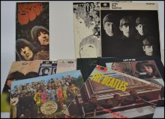 A fantastic collection of vinyl long play records by the Beatles to include Please please Me,