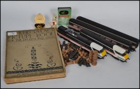 A collection of items to include an Inter City 125 train with carriages and engines, Muffin the