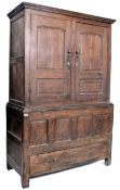 An 18th / 19th century oak armoire wardrobe having