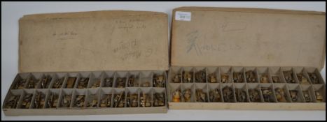 Two boxes of vintage clock 8 day platform escapements to include French , Swiss and English